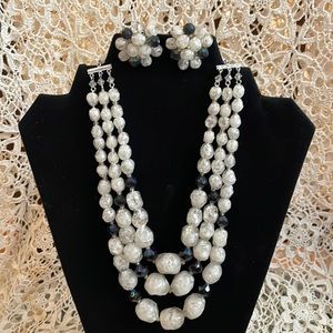 Vintage three tiered crystal black and white beaded necklace and earrings set.